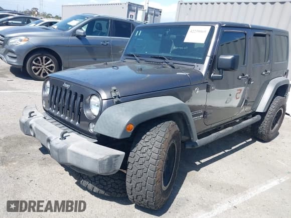 ✅ 2016 Jeep Wrangler Unlimited Sport • VIN: 1C4BJWDG7GL229364 • Lot: 42239069. Wystawiony na IAAI z przebiegiem 87 001 mil. Bezpłatny archiwum sprzedaży aukcyjnych z USA i szczegółowy raport historii pojazdu na DreamBid. Zdjęcie 2.