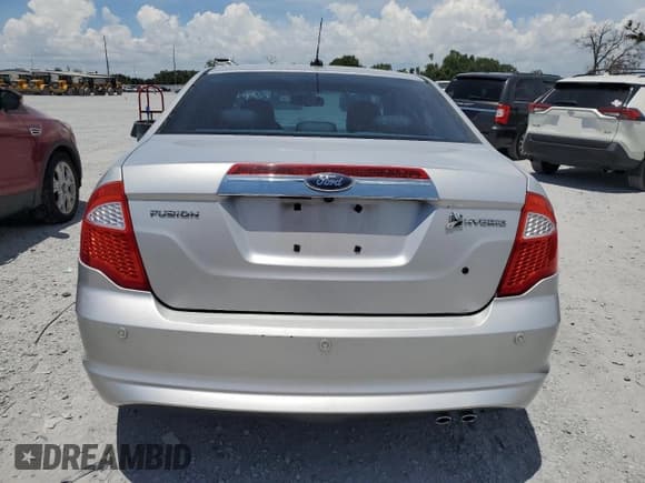 ✅ 2010 Ford Fusion Hybrid • VIN: 3FADP0L39AR182968 • Lot: 66120535. Wystawiony na Copart z przebiegiem 105 952 mil. Bezpłatny archiwum sprzedaży aukcyjnych z USA i szczegółowy raport historii pojazdu na DreamBid. Zdjęcie 6.