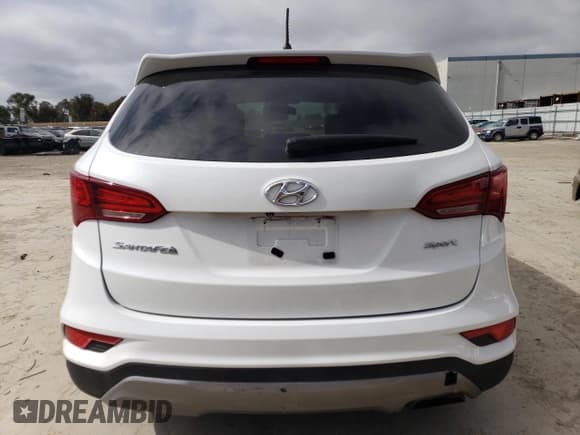 ✅ 2018 Hyundai Santa Fe 2.4L • VIN: 5NMZT3LB0JH069656 • Лот: 49268604. Опубликован ранее на Copart с пробегом 95 553 миль. Бесплатный доступ к архиву аукционных продаж из США и подробный отчёт об истории автомобиля на DreamBid. Изображение 6.