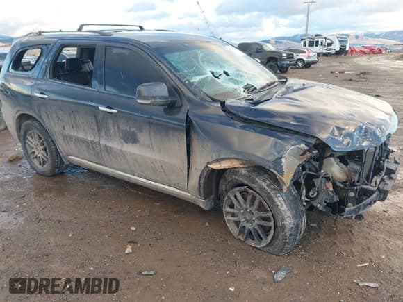 ✅ 2013 Dodge Durango Crew • VIN: 1C4RDJDG9DC682695 • Lot: 41133240. Listed on IAAI with 163,300 mi. Free auction sales archive from the USA and detailed vehicle history report at DreamBid. Image 1.