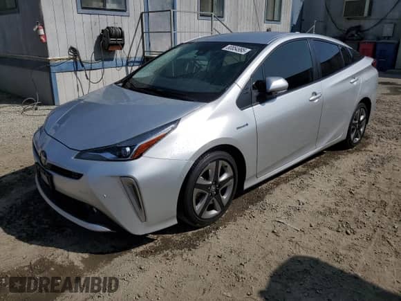 2022 Toyota Prius L Eco с VIN JTDKAMFUXN3188880, выставлен на аукционе Copart как лот 80854995 с пробегом 60 303 миль миль и Списание • Salvage title. История ставок и продаж доступна на DreamBid. Изображение 1.