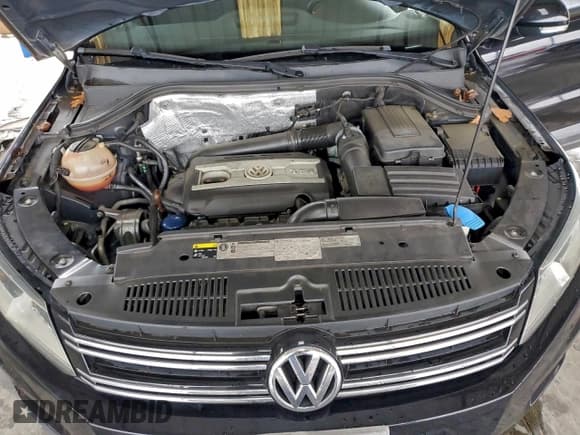 ✅ 2013 Volkswagen Tiguan S • VIN: WVGAV3AX2DW597217 • Lot: 95880665. Listed on Copart with 147,944 mi. Free auction sales archive from the USA and detailed vehicle history report at DreamBid. Image 11.