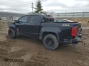 ✅ 2016 Chevrolet Colorado 4WD Z71 • VIN: 1GCGTDE38G1388552 • Лот: 45889164. Опубликован ранее на Copart с пробегом 181 622 миль. Бесплатный доступ к архиву аукционных продаж из США и подробный отчёт об истории автомобиля на DreamBid. Изображение 2.