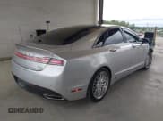 ✅ 2013 Lincoln MKZ Hybrid • VIN: 3LN6L2LU7DR805877 • Lot: 42940503. Wystawiony na IAAI z przebiegiem 122 094 mil. Bezpłatny archiwum sprzedaży aukcyjnych z USA i szczegółowy raport historii pojazdu na DreamBid. Zdjęcie 4.