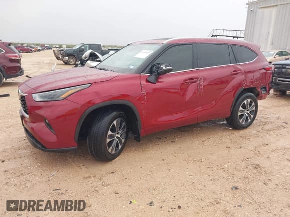 ✅ 2023 Toyota Highlander Hybrid XLE • VIN: 5TDKARAH9PS021998 • Lot: 43535827. Listed on IAAI with 21,623 mi. Free auction sales archive from the USA and detailed vehicle history report at DreamBid. Image 2.