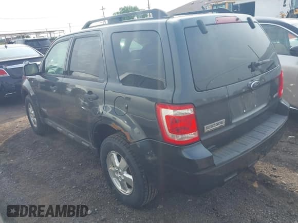 ✅ 2008 Ford Escape XLT • VIN: 1FMCU93108KE60815 • Lot: 42504139. Listed on IAAI with 138,911 mi. Free auction sales archive from the USA and detailed vehicle history report at DreamBid. Image 3.