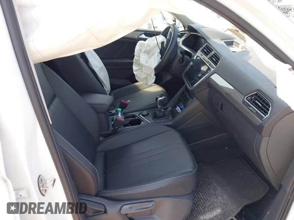 ✅ 2023 Volkswagen Tiguan SE • VIN: 3VVMB7AX2PM003264 • Lot: 42924212. Listed on IAAI with 24,014 mi. Free auction sales archive from the USA and detailed vehicle history report at DreamBid. Image 5.