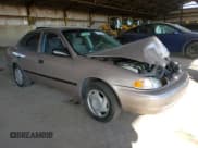 ✅ 1998 Chevrolet Prizm Lsi • VIN: 1Y1SK528XWZ435045 • Lot: 80463624. Listed on Copart with 105,906 mi. Free auction sales archive from the USA and detailed vehicle history report at DreamBid. Image 4.