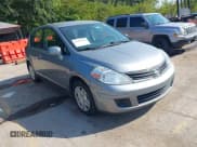 ✅ 2010 Nissan Versa S • VIN: 3N1BC1CP8AL448900 • Lot: 43209629. Listed on IAAI with 181,484 mi. Free auction sales archive from the USA and detailed vehicle history report at DreamBid. Image 1.