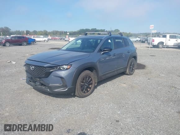 ✅ 2024 Mazda CX-50 S Preferred • VIN: 7MMVABBM1RN213702 • Lot: 43359850. Listed on IAAI with 34,042 mi. Free auction sales archive from the USA and detailed vehicle history report at DreamBid. Image 17.