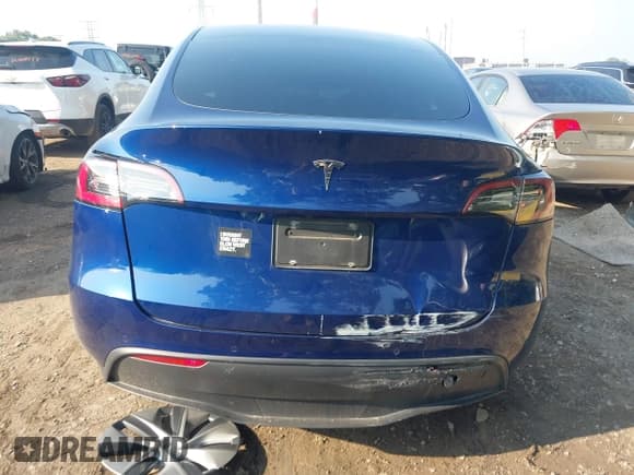 ✅ 2021 Tesla Model Y Standard Range • VIN: 5YJYGDED0MF163305 • Lot: 42893083. Listed on IAAI with 40,688 mi. Free auction sales archive from the USA and detailed vehicle history report at DreamBid. Image 17.