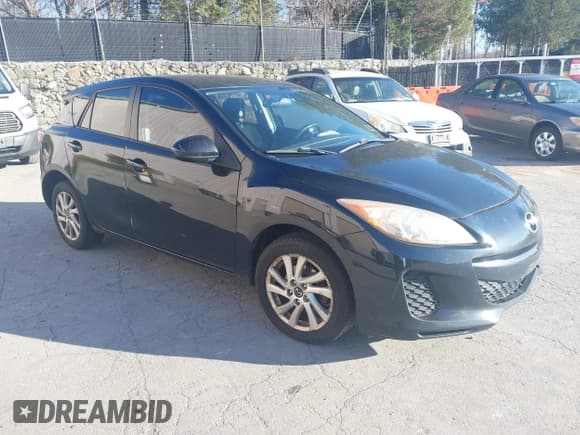 ✅ 2013 Mazda 3 i Touring • VIN: JM1BL1LP2D1788519 • Lot: 43770102. Listed on IAAI with 212,808 mi. Free auction sales archive from the USA and detailed vehicle history report at DreamBid. Image 1.