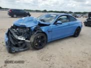 ✅ 2015 BMW M4 • VIN: WBS3R9C59FK335424 • Lot: 56173675. Listed on Copart with 114,999 mi. Free auction sales archive from the USA and detailed vehicle history report at DreamBid. Image 1.