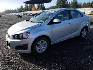 2014 Chevrolet Sonic LT с VIN 1G1JC5SG2E4152700, выставлен на аукционе Copart как лот 90410025 с пробегом 153 812 миль миль и Чистый • Clean title. История ставок и продаж доступна на DreamBid. Изображение 1.