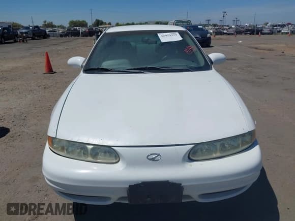✅ 1999 Oldsmobile Alero GL • VIN: 1G3NL52E7XC322064 • Lot: 42929959. Wystawiony na IAAI z przebiegiem 160 336 mil. Bezpłatny archiwum sprzedaży aukcyjnych z USA i szczegółowy raport historii pojazdu na DreamBid. Zdjęcie 6.
