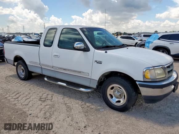 ✅ 1997 Ford F-150 XL • VIN: 1FTEX17L4VNB66944 • Lot: 62298315. Wystawiony na Copart z przebiegiem 172 314 mil. Bezpłatny archiwum sprzedaży aukcyjnych z USA i szczegółowy raport historii pojazdu na DreamBid. Zdjęcie 4.