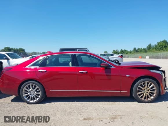 ✅ 2018 Cadillac CT6 AWD • VIN: 1G6KB5RS3JU116763 • Lot: 43053586. Listed on IAAI with 117,724 mi. Free auction sales archive from the USA and detailed vehicle history report at DreamBid. Image 14.
