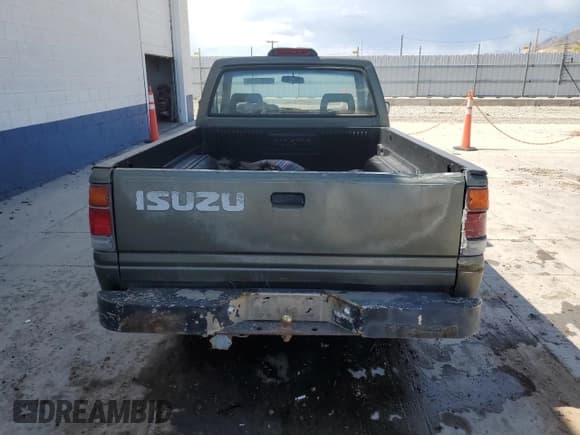 ✅ 1994 Isuzu Pickup S • VIN: JAACL11L2R7221226 • Лот: 59027295. Опубликован ранее на Copart с пробегом 129 494 миль. Бесплатный доступ к архиву аукционных продаж из США и подробный отчёт об истории автомобиля на DreamBid. Изображение 6.
