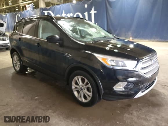 ✅ 2017 Ford Escape SE • VIN: 1FMCU0GD9HUC98834 • Lot: 93604985. Listed on Copart with 144,041 mi. Free auction sales archive from the USA and detailed vehicle history report at DreamBid. Image 4.