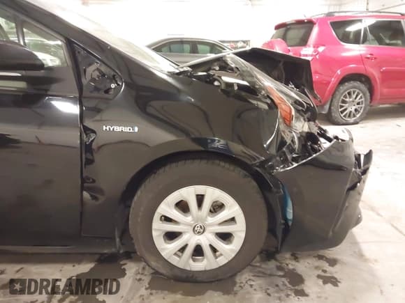 ✅ 2022 Toyota Prius L Eco • VIN: JTDKAMFU6N3189315 • Lot: 43616635. Listed on IAAI with 67,156 mi. Free auction sales archive from the USA and detailed vehicle history report at DreamBid. Image 18.