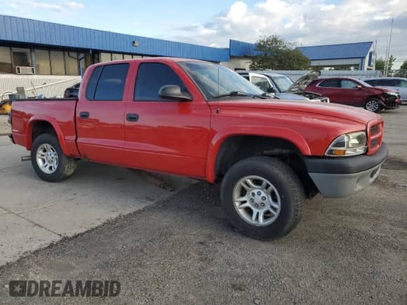 2003 Dodge Dakota SLT с VIN 1D7HG48NX3S345590, выставлен на аукционе Copart как лот 70002875 с пробегом 437 659 миль миль и Чистый • Clean title. История ставок и продаж доступна на DreamBid. Изображение 4.