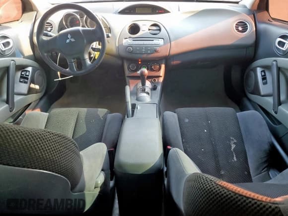 ✅ 2007 Mitsubishi Eclipse GT • VIN: 4A3AK34T57E049290 • Лот: 67752205. Опубликован ранее на Copart с пробегом 132 554 миль. Бесплатный доступ к архиву аукционных продаж из США и подробный отчёт об истории автомобиля на DreamBid. Изображение 8.