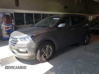 ✅ 2018 Hyundai Santa Fe 2.4L • VIN: 5XYZUDLBXJG532383 • Лот: 50864484. Опубликован ранее на Copart с пробегом 76 124 миль. Бесплатный доступ к архиву аукционных продаж из США и подробный отчёт об истории автомобиля на DreamBid. Изображение 1.