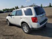 ✅ 2011 Mazda Tribute Grand Touring • VIN: 4F2CY9GG2BKM03577 • Lot: 57143185. Listed on Copart with 173,537 mi. Free auction sales archive from the USA and detailed vehicle history report at DreamBid. Image 2.