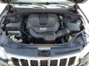 ✅ 2013 Jeep Grand Cherokee Laredo • VIN: 1C4RJFAG7DC645932 • Lot: 57969715. Listed on Copart with 165,717 mi. Free auction sales archive from the USA and detailed vehicle history report at DreamBid. Image 12.