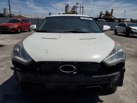 2013 Hyundai Veloster Turbo z VIN KMHTC6AE9DU108290, wystawiony jako Copart lot #70427295 z przebiegiem 215 957 mil mil oraz Czysty tytuł • Clean title. Historia ofert i sprzedaży dostępna na DreamBid. Obrazek 5.