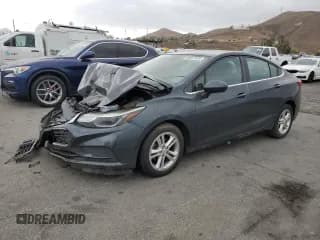 ✅ 2018 Chevrolet Cruze LT • VIN: 1G1BE5SM6J7107630 • Lot: 86537835. Listed on Copart with 118,854 mi. Free auction sales archive from the USA and detailed vehicle history report at DreamBid. Image 1.