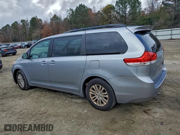 ✅ 2011 Toyota Sienna XLE • VIN: 5TDYK3DC5BS107581 • Lot: 94443025. Listed on Copart with 187,943 mi. Free auction sales archive from the USA and detailed vehicle history report at DreamBid. Image 2.