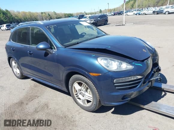 ✅ 2012 Porsche Cayenne S • VIN: WP1AB2A27CLA49899 • Lot: 42081215. Listed on IAAI with 147,920 mi. Free auction sales archive from the USA and detailed vehicle history report at DreamBid. Image 1.
