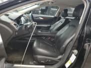 ✅ 2014 Lincoln MKZ Hybrid • VIN: 3LN6L2LU6ER817391 • Lot: 91230165. Wystawiony na Copart z przebiegiem 130 725 mil. Bezpłatny archiwum sprzedaży aukcyjnych z USA i szczegółowy raport historii pojazdu na DreamBid. Zdjęcie 7.