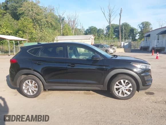 2019 Hyundai Tucson SE with VIN KM8J2CA40KU001142, listed as a IAAI auction lot 43362303 with 70,504 mi miles and . Bid and sale history available at DreamBid. Image 13.