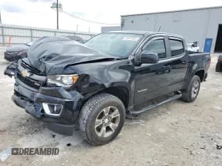 ✅ 2018 Chevrolet Colorado 4WD Z71 • VIN: 1GCGTDEN2J1213450 • Лот: 70975404. Опубликован ранее на Copart с пробегом 46 307 миль. Бесплатный доступ к архиву аукционных продаж из США и подробный отчёт об истории автомобиля на DreamBid. Изображение 1.