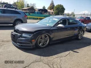 ✅ 2013 Audi S7 Prestige • VIN: WAUW2AFC2DN134803 • Лот: 82137175. Опубликован ранее на Copart с пробегом Не указан. Бесплатный доступ к архиву аукционных продаж из США и подробный отчёт об истории автомобиля на DreamBid. Изображение 1.