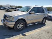 ✅ 2001 Mercedes-Benz M 320/430/500 • VIN: 4JGAB54E31A242466 • Лот: 80584225. Опубликован ранее на Copart с пробегом 174 690 миль. Бесплатный доступ к архиву аукционных продаж из США и подробный отчёт об истории автомобиля на DreamBid. Изображение 1.