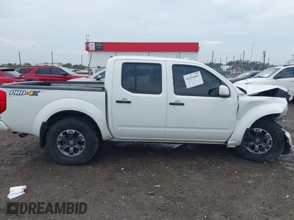 ✅ 2018 Nissan Frontier SV • VIN: 1N6AD0EV2JN713304 • Lot: 43231652. Listed on IAAI with 162,298 mi. Free auction sales archive from the USA and detailed vehicle history report at DreamBid. Image 14.