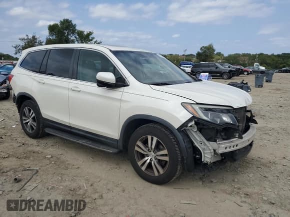 ✅ 2017 Honda Pilot EX-L • VIN: 5FNYF6H77HB031118 • Lot: 81370035. Listed on Copart with 166,144 mi. Free auction sales archive from the USA and detailed vehicle history report at DreamBid. Image 4.