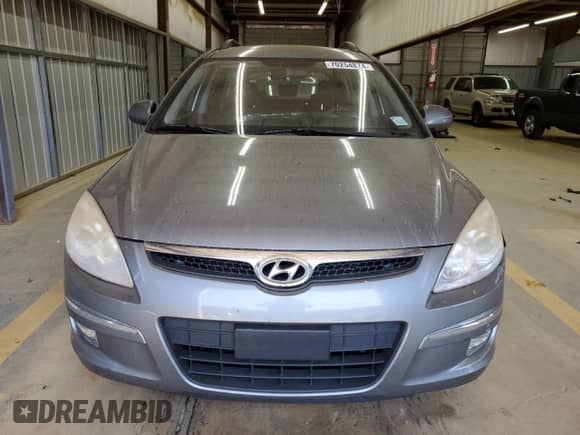 2010 Hyundai Elantra SE z VIN KMHDC8AE7AU060896, wystawiony jako Copart lot #71583564 z przebiegiem 123 991 mil mil oraz Szkoda całkowita • Salvage title. Historia ofert i sprzedaży dostępna na DreamBid. Obrazek 5.