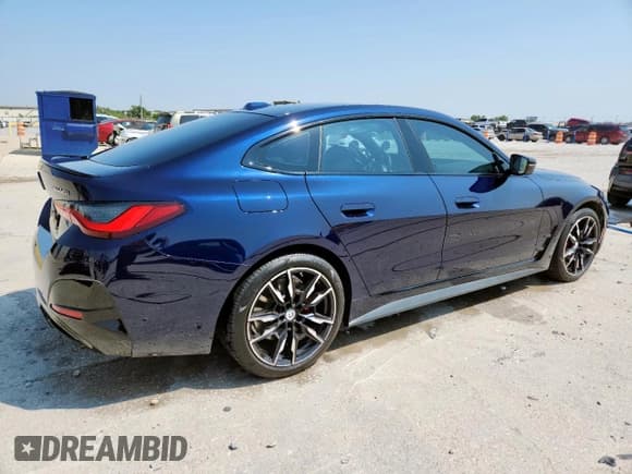✅ 2023 BMW 4 Series M440i xDrive • VIN: WBA13AW04PFP06529 • Lot: 71443855. Listed on Copart with 11,992 mi. Free auction sales archive from the USA and detailed vehicle history report at DreamBid. Image 3.