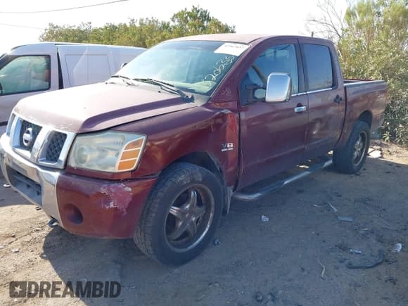 ✅ 2004 Nissan Titan SE • VIN: 1N6AA07B94N520633 • Lot: 42967037. Listed on IAAI with 239,838 mi. Free auction sales archive from the USA and detailed vehicle history report at DreamBid. Image 2.