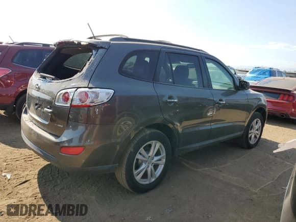 ✅ 2012 Hyundai Santa Fe Limited • VIN: 5XYZKDAG1CG120408 • Lot: 75483254. Listed on Copart with 118,834 mi. Free auction sales archive from the USA and detailed vehicle history report at DreamBid. Image 3.