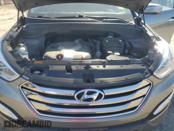 ✅ 2015 Hyundai Santa Fe • VIN: 5XYZWDLA3FG275477 • Lot: 91077545. Listed on Copart with 123,224 mi. Free auction sales archive from the USA and detailed vehicle history report at DreamBid. Image 12.