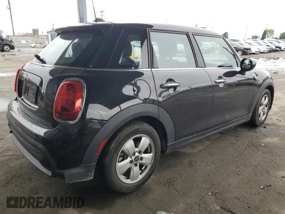 ✅ 2022 MINI Hardtop 4 Door Cooper • VIN: WMW33DK04N2P59705 • Лот: 44450745. Опубликован ранее на Copart с пробегом 26 803 миль. Бесплатный доступ к архиву аукционных продаж из США и подробный отчёт об истории автомобиля на DreamBid. Изображение 3.