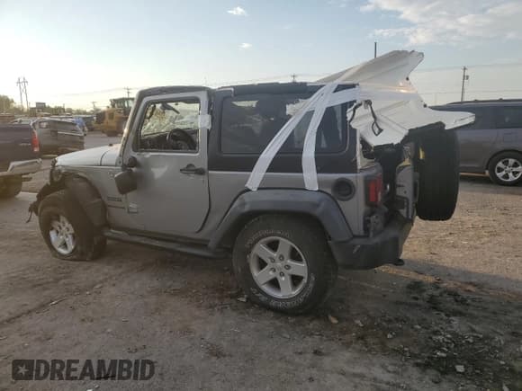 ✅ 2015 Jeep Wrangler Sport • VIN: 1C4AJWAG2FL690339 • Lot: 81990305. Listed on Copart with Not provided. Free auction sales archive from the USA and detailed vehicle history report at DreamBid. Image 2.