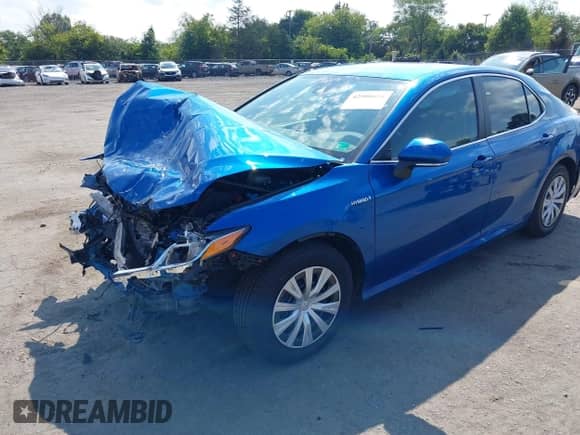 2020 Toyota Camry Hybrid LE z VIN 4T1L31AK3LU015174, wystawiony jako IAAI lot #42986656 z przebiegiem 87 251 mil mil oraz . Historia ofert i sprzedaży dostępna na DreamBid. Obrazek 2.