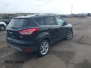 ✅ 2013 Ford Escape Titanium • VIN: 1FMCU9J9XDUC53579 • Lot: 42166603. Listed on IAAI with 112,736 mi. Free auction sales archive from the USA and detailed vehicle history report at DreamBid. Image 4.