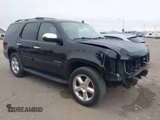 2012 Chevrolet Tahoe LT z VIN 1GNSCBE01CR225880, wystawiony jako IAAI lot #42622033 z przebiegiem 207 604 mil mil oraz . Historia ofert i sprzedaży dostępna na DreamBid. Obrazek 1.